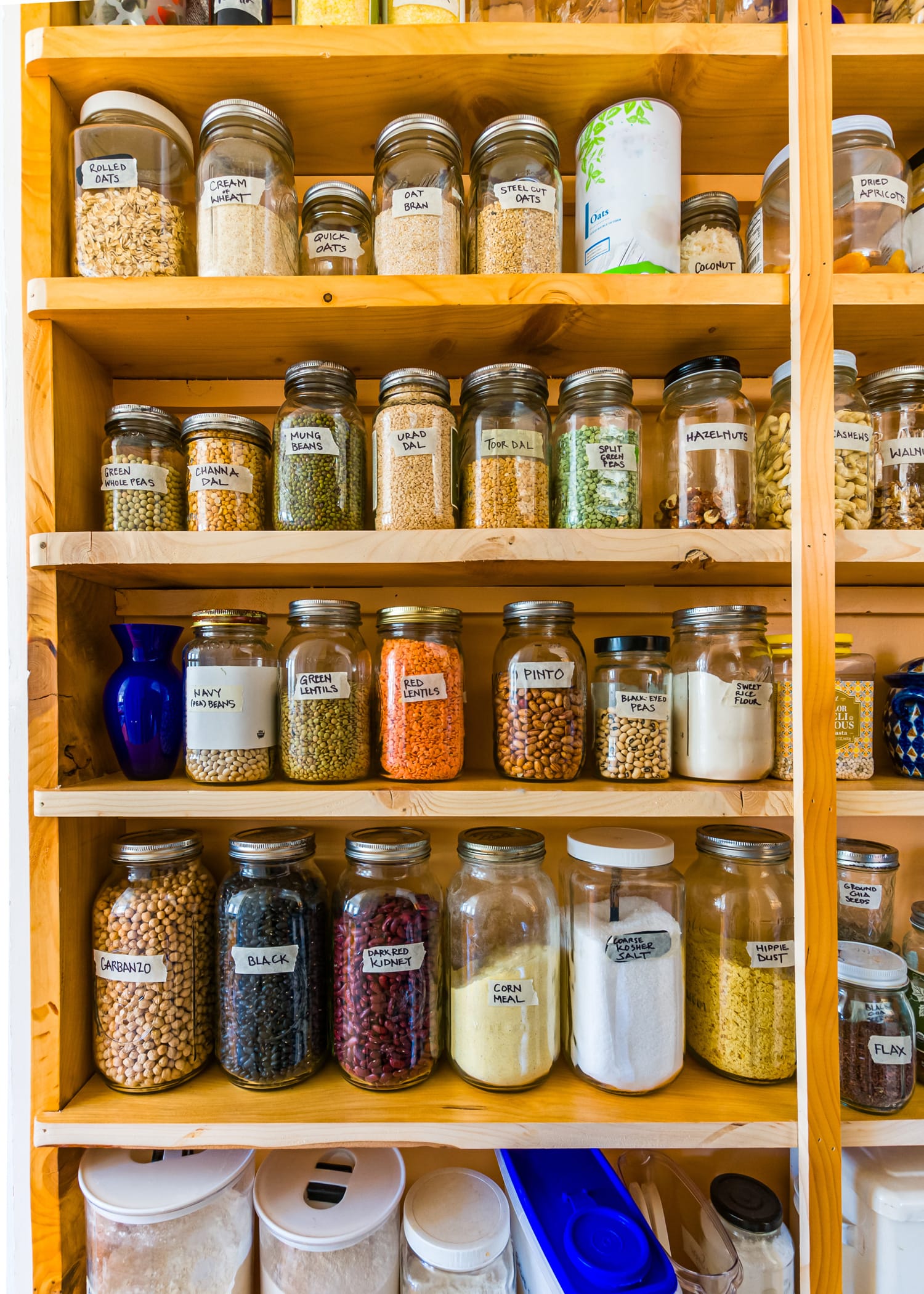 pantry filled with repurposed jars for food storage