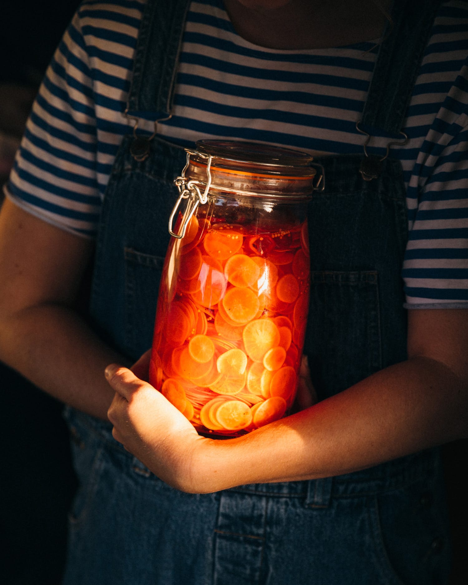 a jar of pickled oranges