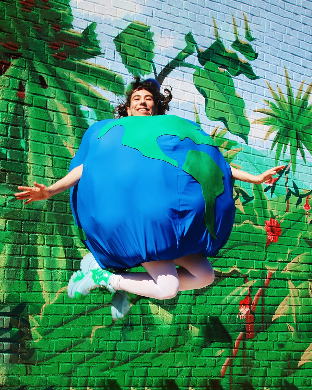 hila the earth jumping in air.