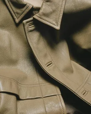 Close up of a leather jacket. What is vegan leather.