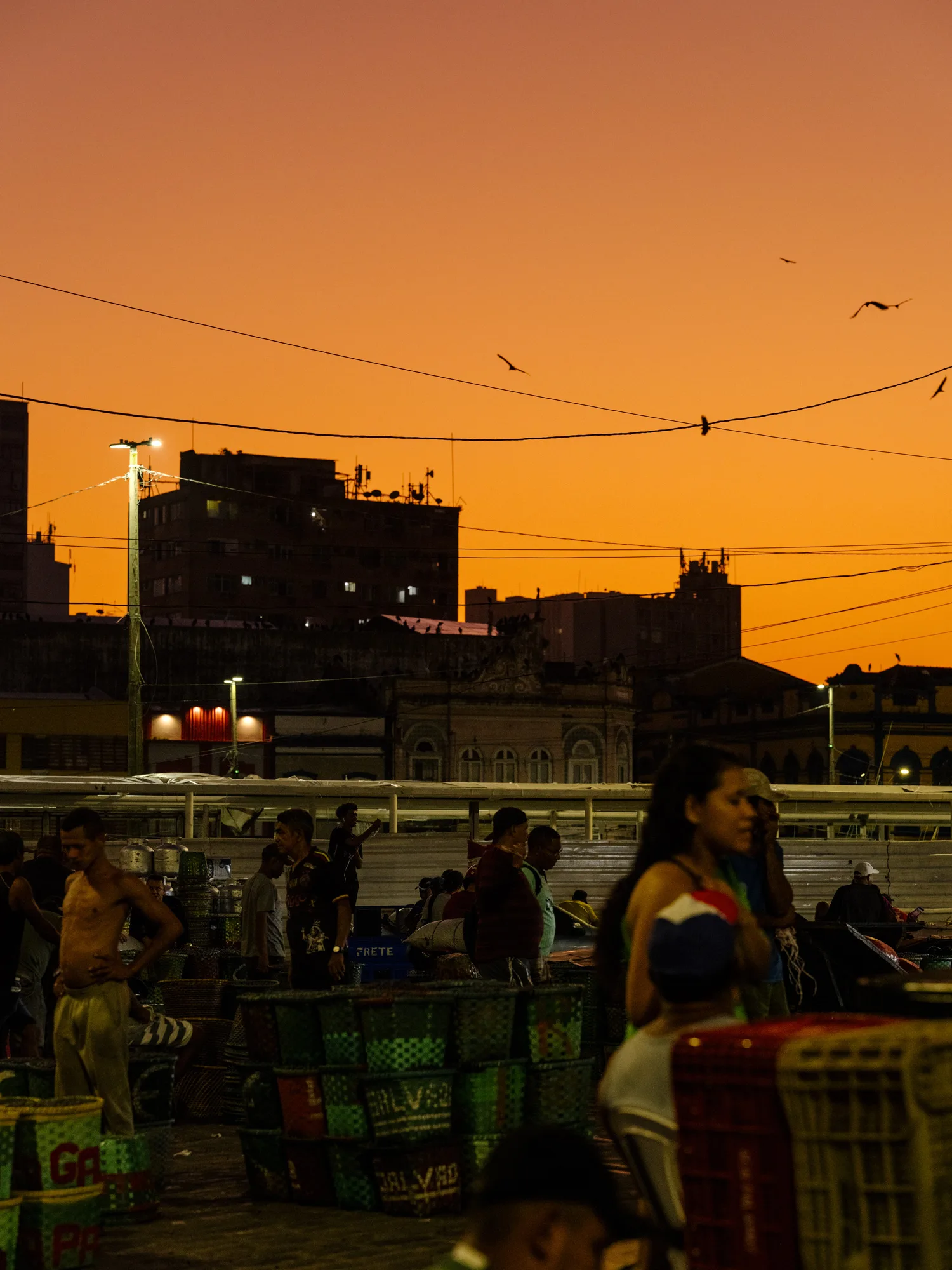 The sun sets near the açaí market at Belém harbor.